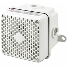 Indoor horn alarm for hazardous locations, rated 5 W at 24V DC with dual voltage support (12V DC/24V DC). Gray finish. Produces a horn sound for industrial signaling in environments requiring audible alerts for safety or process control.