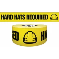Polyethylene barricade tape, 3 inches wide by 1000 feet long, black with yellow 'Hard Hats Required' legend. Used to mark and cordon off worksite areas where head protection is mandatory, such as construction, industrial, and maintenance zones