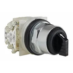 This SCHNEIDER selector switch from the 9001K series features a 30 mm panel-mount design with a short-handled knob operator head made of polycarbonate and a metallic bezel. It offers three positions with momentary/off/momentary action (Cam C) and DPDT contacts, rated 6 A at 120 V AC and 0.1 A at 600 V DC. Suitable for industrial control circuits requiring manual mode selection.