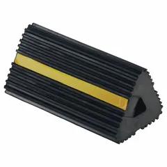 Black rubber wheel chock, 6 1/2 in long, 12 in wide, 5 3/4 in high. Single chock without handles. Used to prevent parked vehicles, trailers, and industrial equipment from rolling at loading docks, warehouses, and fleet maintenance yards.