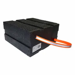 Rectangular cribbing block made from HDPE/LDPE with a black body and orange handle. Rated for 60 tons vertical load capacity, with an overall length of 12 inches. Used for load support and stabilization during heavy equipment lifting, rigging, or maintenance in industrial environments.