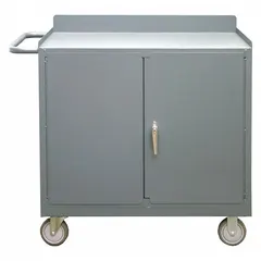 This fully assembled steel mobile cabinet bench includes shelves for organized storage. With a 1200 lb overall load capacity, it supports heavy tools and parts in industrial workshops and maintenance facilities. A side handle enables easy repositioning around the plant floor.