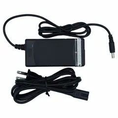Plastic, black battery charger accessory for recharging batteries in powered hand trucks. Used in material handling settings such as warehouses and distribution centers to maintain electric pallet jacks or lift trucks.