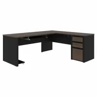 L-shaped desk from the Connexion Series, constructed of laminate particle board in Black with a Black Matrix desktop. Rated to ANSI/BIFMA standards for commercial use. Overall width 71 1/8 in, depth 82 7/8 in. Suitable for corner placement in office environments