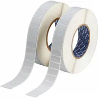 Precut label roll made of polyimide with permanent adhesive and a white gloss finish. Each label measures 1 in x 1/2 in. Compatible with BBP12 printer series. Used for durable identification in industrial environments such as electrical panel labeling, asset tagging, and component marking
