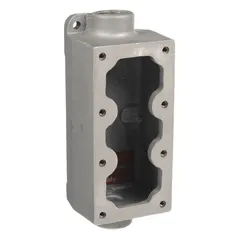 This rectangular aluminum electrical box accommodates up to three devices in hazardous locations. It features a 1/2-inch feed-through hub for conduit entry and is designed for use in environments where flammable gases or vapors may be present. Suitable for industrial plants, refineries, and chemical processing facilities requiring safe electrical connections.