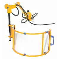 This curved shield guard measures 23 1/2" x 9 1/2" and includes a safety-interlock switch. It is designed for adjustable mounting on milling machines to protect operators from flying chips, coolant splash, and rotating cutter contact during manual or CNC milling operations