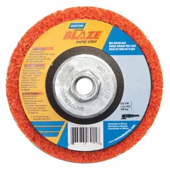 This NORTON Blaze Rapid Strip disc is a non-woven depressed center abrasive for cool-cutting coating removal. The ceramic, extra-coarse grain aggressively strips paint, rust, and adhesives without loading or excessive heat buildup. Suitable for surface preparation on various materials in industrial maintenance and fabrication applications.