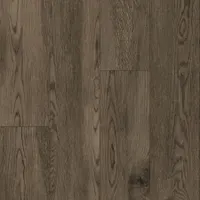 Luxury vinyl tile (LVT) flooring with an Ada Oak wood-look pattern in Brunette color. Each tile is 6 inches wide, and the package covers 35.95 square feet. Suitable for residential and light-commercial applications such as kitchens, bathrooms, basements, and living areas