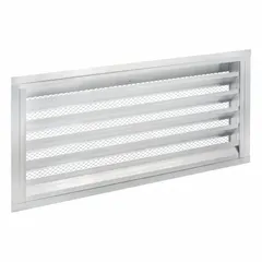 This drainable stationary-blade louver is designed for intake applications in ventilation systems. Constructed from extruded aluminum with a flanged surface-mount design, it allows air passage while shedding rain. Rated for a maximum air velocity of 3500 fpm, it is suitable for wall openings requiring weather-resistant airflow.