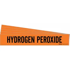 Orange adhesive pipe marker with black legend reading 'Hydrogen Peroxide'. Designed for pipes with outer diameter of 8 inches and larger. Sold in packs of 5, without directional arrows. Used to identify piping systems carrying hydrogen peroxide in industrial facilities.