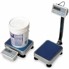 This bench scale features a column-mounted indicator and a stainless steel weighing surface measuring 15 3/8 x 20 7/8 in. It provides readability of 0.005 kg/0.01 lb and includes an RS-232C port for data communication. Suitable for general industrial weighing tasks such as parts counting, checkweighing, and laboratory use where accurate weight measurement and data transfer are required.