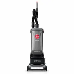 This cordless upright vacuum features a brushless motor, 35 cfm airflow, and a floating head for height adjustment. It includes an onboard hose, independent brush motor, and a HEPA bag filtration system. Suitable for cleaning carpets and hard floors in commercial or residential settings.