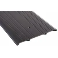 Aluminum saddle threshold, 6 ft long, with a fluted transition type. Designed to bridge gaps under doors, sealing against drafts, moisture, and debris in commercial or industrial doorways