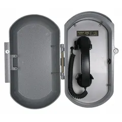 The ACR-11 is a surface-mount, wall-mountable ringdown telephone with a gray aluminum casting. It features a spring-loaded door with magnetic latch, keylock door, and curly cord. Supports 10/100 Mbps Ethernet and PSTN connectivity. Designed for outdoor use in hazardous areas such as industrial plants and refineries.