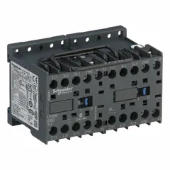 This SCHNEIDER miniature reversing IEC contactor is rated at 9 A with a 24V DC coil. It features 3 poles and 3 normally open contacts. Designed for controlling forward and reverse rotation of three-phase motors in applications such as conveyors, pumps, and hoists. No integrated surge suppression.