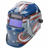 Auto-darkening welding helmet with American Flag graphic in blue, red, and white. Features digital ADF controls with welding shades W7-W13, 3.78 x 1.85 in viewing area, grind mode, ratchet suspension adjustment, and proprietary nylon shell. Suitable for arc welding processes such as MIG, TIG, and stick welding