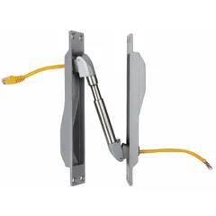 Metal power transfer unit designed to conduct 24V DC at 1 A across door hinges for alarm systems. Overall length 1 3/4 in, width 1 1/4 in. Used in commercial and industrial security applications requiring low-voltage power through a swinging door.