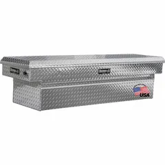This single-lid crossover box is constructed of aluminum with a silver finish. It measures 71 inches in overall width and is designed for mounting across a pickup truck bed. Provides secure, weather-resistant storage for tools and equipment.