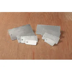 Aluminum laminated blank valve tags in silver finish. Each tag is 0.02 inches thick and rectangular. Pack of 25. Suitable for general-purpose valve identification in industrial piping systems.