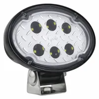This GROTE LED spotlight features an oval shape with a 5 15/16 in diameter and 2 3/4 in depth. It uses a Deutsch DT electrical connection for secure installation. Suitable for close-range work lighting on vehicles, construction equipment, and industrial machinery