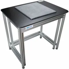 Fixed-height lab table with a granite work surface, silver and aluminum finish. Overall dimensions: 31 1/2 in length, 23 1/2 in width, 30 3/4 in height. Suitable for precision weighing, sample preparation, and chemical-resistant tasks in laboratory and testing environments.
