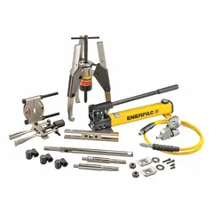 This hydraulic ram puller set is used for controlled removal and installation of press-fit components such as bearings, gears, and pulleys. The set includes a 14 ton capacity cylinder with a 1 in stroke, a hand pump, and a gauge adaptor assembly.
