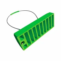 Urethane aircraft wheel chock in green, measuring 20 inches overall length, 8 inches overall width, and 6 1/2 inches overall height. Includes one chock. Used to secure aircraft during ground operations, preventing unintended movement on tarmacs and in hangars