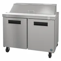 This HOSHIZAKI refrigerated prep table offers 12 cu ft of storage with two doors, a height of 44 1/4 in, and a depth of 31 in. It features thermostatic control for temperature management. Suitable for commercial food preparation areas requiring chilled ingredient storage and a work surface