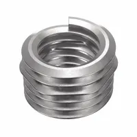 Screw-locking tangless helical insert for repairing or reinforcing threads in metal components. Features 18-8 stainless steel construction, plain finish, and 1/4"-20 coarse thread. Requires 1/4"-28 STI tap. Tensile strength 200,000 to 250,000 psi. Supplied in 1,000-piece pack
