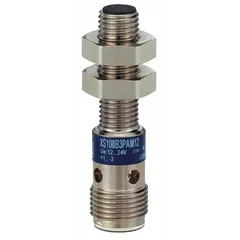 This shielded inductive cylindrical proximity sensor features a built-in connector and 3-wire configuration. It operates on a 12-24V DC supply voltage and is designed for non-contact detection of metallic objects in industrial automation applications such as position sensing and part detection.