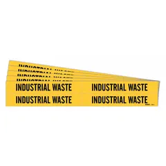 Yellow adhesive pipe marker with black legend 'Industrial Waste' for identifying waste piping. Fits pipe outer diameters from 3/4 to 2-3/8 inches. Pack includes 4 markers without arrows. Suitable for facility piping systems requiring clear waste line identification.