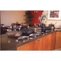 This buffet server from SPRING USA features a stainless steel base and lid with a bronze finish. With an overall diameter of 15 1/4 in and depth of 18 3/4 in, it is suited for serving and holding food at catered events, buffets, and banquets