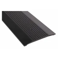 Aluminum saddle threshold, 4 ft length, with fluted transition type. Used to seal the gap under doors in commercial or industrial facilities, reducing drafts, debris, and pest entry while providing a smooth transition across the doorway