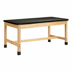This fixed-height lab table features a black laminate countertop with an oak wood finish. It measures 30 inches wide, 42 inches high, and 5 feet long. Suitable for use in educational, industrial, and laboratory settings as a stable work surface for testing, assembly, or instruction.