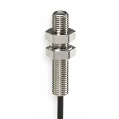 Shielded inductive cylindrical proximity sensor with PNP output and non-terminated cable. Operates on 12-24V DC supply voltage. Detects metallic objects without contact, used in industrial automation for position sensing, part detection, and machine control.