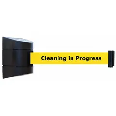 This wall-mount retractable belt barrier features a 15 ft yellow belt with black maintenance and cleaning messaging. The frame is black. It is used to manage pedestrian flow and cordon off areas in facilities such as airports, stadiums, and office buildings, clearly communicating restricted zones.