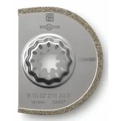 Diamond grit coated scraper blade for Starlock oscillating tools. 3 in blade length with rounded shape for aggressive removal of adhesives, paint, grout, and coatings from flat surfaces. Starlock connection ensures quick, tool-free blade changes.
