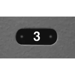 Acrylic number plate with black background and white lettering. Measures 1 5/8 in x 1/2 in. Used for labeling equipment, panels, or machinery in industrial and commercial settings.