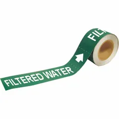 Green adhesive pipe marker with white 'Filtered Water' legend and directional arrows. Designed for pipes with outer diameters from 2-1/2 to 6 inches. Each roll contains 25 markers for identifying filtered water lines in industrial piping systems.