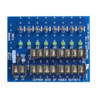Plastic power distribution board for 12 to 28V DC input. Distributes power from a single source to multiple outputs, simplifying wiring in access control and security systems. Used to organize power routing for electric locks, maglocks, and controllers in commercial facilities