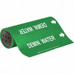 Green adhesive pipe markers with white legend reading 'Demin. Water' and directional arrows. Each marker fits pipe outer diameters from 2-1/2 to 6 inches. Pack of 30 markers for identifying demineralized water lines in industrial piping systems.
