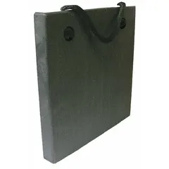 Square polymer jack plate with 100 ton vertical load capacity and 18 in overall length. Black body with orange handle. Used under outriggers of cranes, aerial lifts, and heavy machinery to distribute loads and prevent ground sinkage on soft or uneven surfaces.