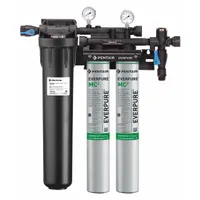 This multi-purpose water filter system reduces chlorine taste using carbon filter media. It features a 3.3 gpm flow rate, NPT connections, and a capacity of 18,000 gallons. The overall height is 25 1/2 inches. Suitable for point-of-use applications requiring carbon filtration