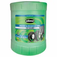 Liquid tire repair sealant for tubeless tires, supplied in a 5-gallon green bucket. Seals punctures in the tread area to prevent air loss, suitable for use in automotive, agricultural, and off-road applications as a temporary repair
