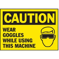 Adhesive-mounted polyester caution signs, 3 1/2 in x 5 in nominal size, 0.01 in thick. Sold in packs of 5. Suitable for placement on machinery or nearby surfaces to remind personnel to wear eye protection in work areas where goggles are required.
