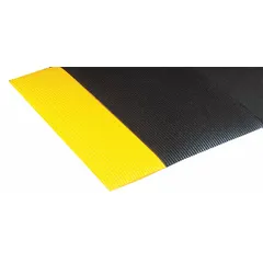 This PVC foam antifatigue mat measures 4 ft x 60 ft with a 1/2 in thickness. It features a black surface with a yellow border and an anti-slip backing for workplace safety. Suitable for use in industrial aisles, workstations, and assembly lines to reduce worker fatigue and provide slip resistance.