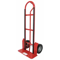 This hand truck features a single-loop handle and a red steel frame. It is equipped with flat-free 10-inch wheels for use on various surfaces without tire maintenance. Suitable for moving loads in warehouses, factories, and delivery settings.