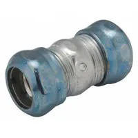 This steel compression conduit coupling connects two lengths of EMT conduit in electrical raceway systems. It has a 1 1/2 in trade size, 2 25/32 in overall length, zinc-plated finish, and includes a clamp. The coupling is rain tight and complies with UL 514B standards