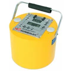 This compaction and density gauge measures soil compaction and density in the field. It features an LCD display and a measuring depth of 9 to 12 inches (230 to 310 mm). Instructions are included. Typical applications include construction and geotechnical testing to assess soil stability and load-bearing capacity.